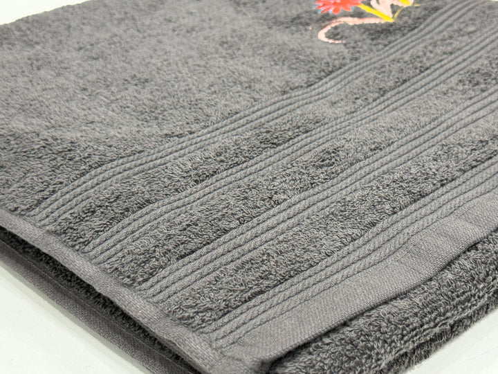 Stack of Bedsy PlushSoft embroidered cotton bath towels, soft, absorbent, and durable, luxury bathroom essentials in Pakistan