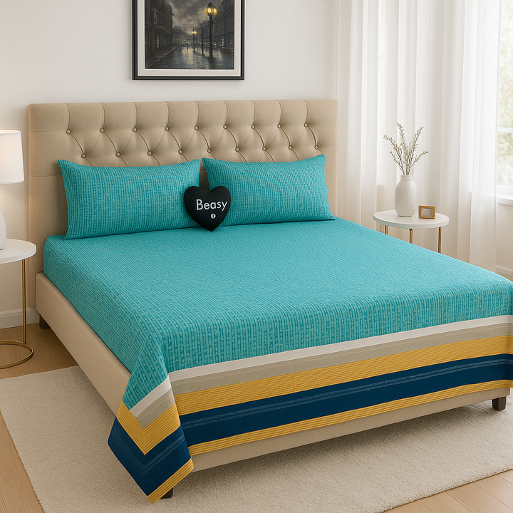 Bedsy AquaLuxe bedsheet set displayed on a bed, highlighting its pure cotton fabric, cool aqua-inspired colour and matching pillowcases for a fresh modern bedroom.